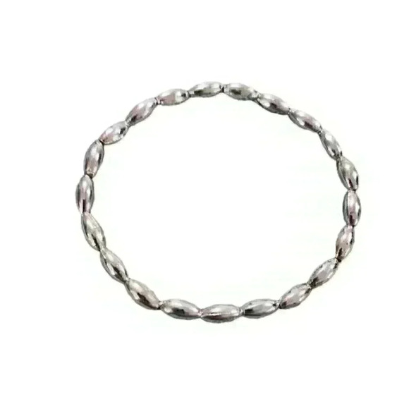 Child's Silver toned plastic bracelet-stretchy and very light 2.5 inches - Picture 1 of 5
